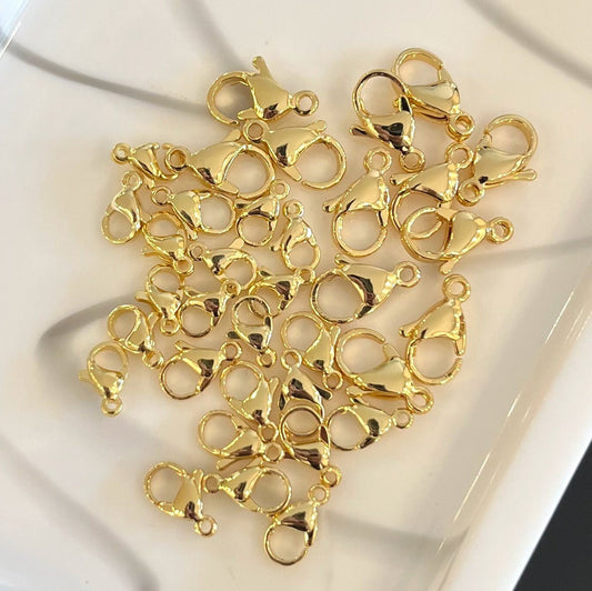 Collection of 18K gold filled lobster clasps in multiple sizes for jewelry making