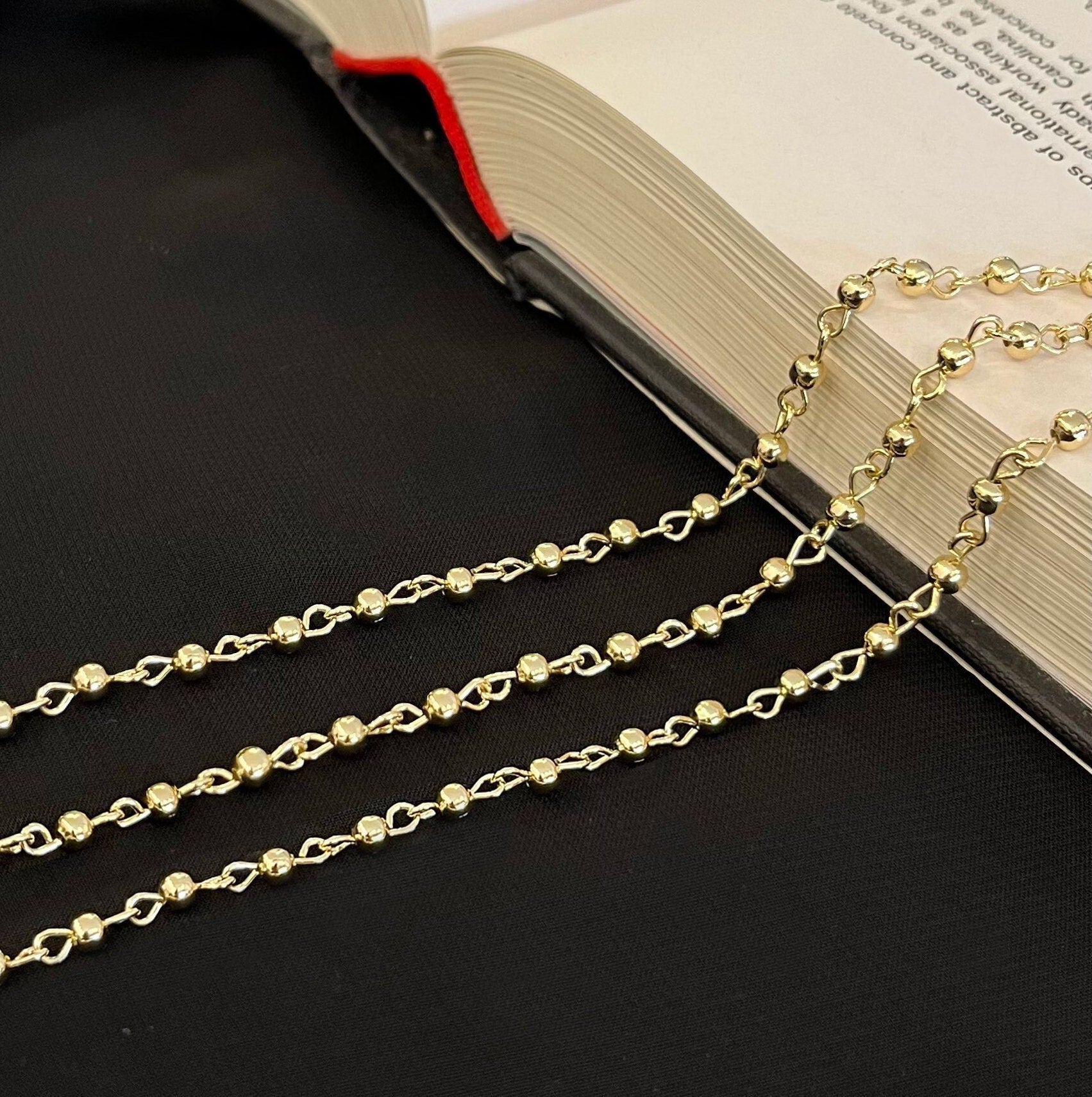 Gold filled beaded chain close-up showing detailed texture and golden finish
