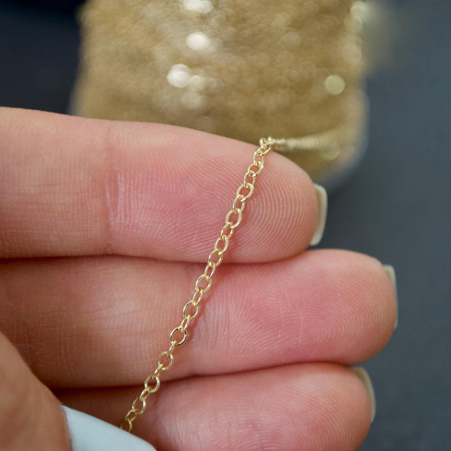 Gold filled 1.5mm flat cable chain close-up detail dainty design

