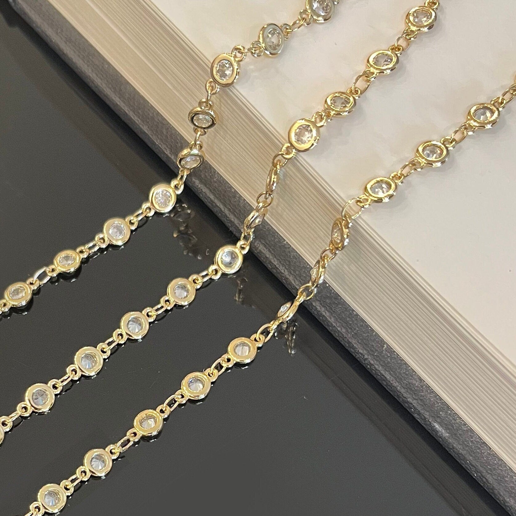 Gold filled CZ chain with crystal beads close-up sparkling detail