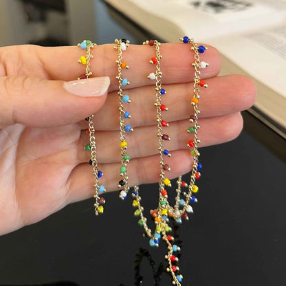 Gold filled beaded chain with multicolor beads close-up detail