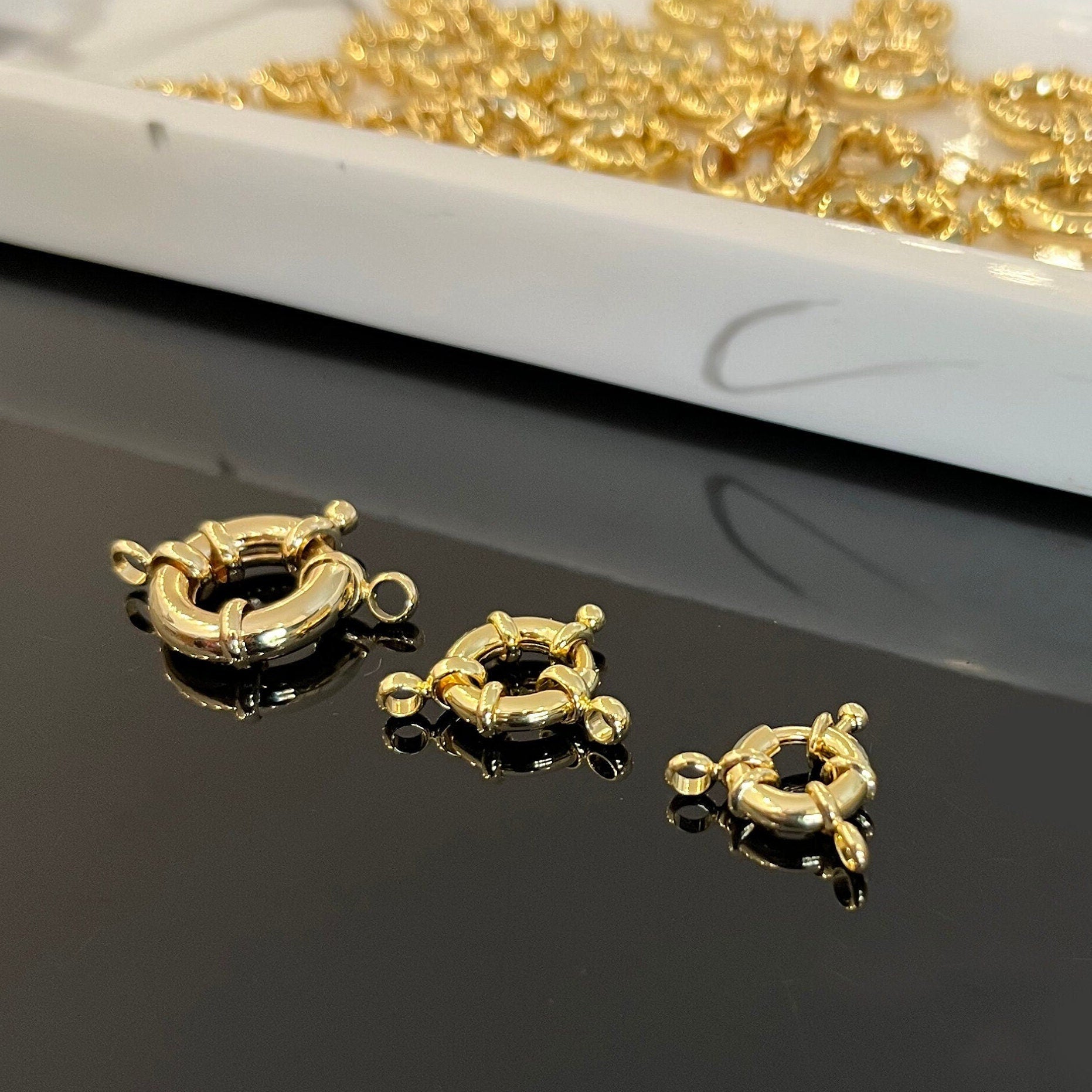 18K gold filled sailor clasps in various sizes from 10-16mm displayed on white background
